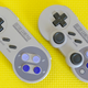 8Bitdo SN30 on the left, compared to the SN30 Pro on the right. Notice the position of the D-pad and action buttons has been slightly changed.